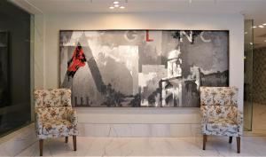 De Glance Hotel, Near Surat Railway Station的休息区