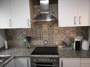 Kuchyňa alebo kuchynka v ubytovaní Apartamentos Hawaii - Parking y 50 mt del Arenal