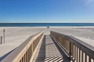 a wooden boardwalk leading to the beach at Gulf Tower 14W in Gulf Shores