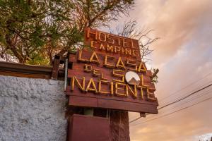 a sign for a lost american league of nintendo at La Casa del Sol Naciente in San Pedro de Atacama