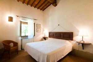 A bed or beds in a room at La Spinetta