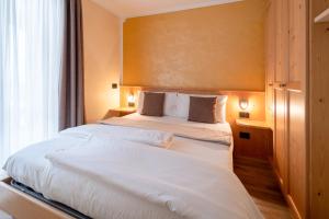 Voodi või voodid majutusasutuse Negritella Sweet Hotel toas