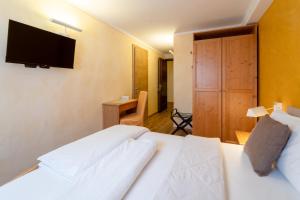 Voodi või voodid majutusasutuse Negritella Sweet Hotel toas