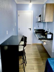 A cozinha ou cozinha compacta de Residencial Gralha Azul