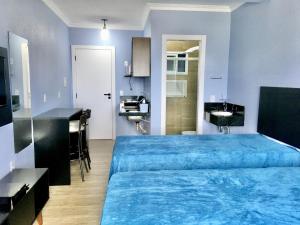 Cama ou camas em um quarto em Residencial Gralha Azul