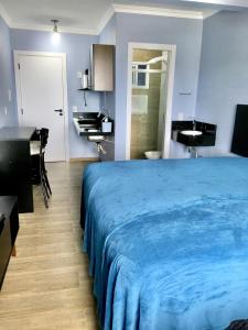 Cama ou camas em um quarto em Residencial Gralha Azul
