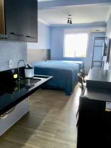 Cama ou camas em um quarto em Residencial Gralha Azul