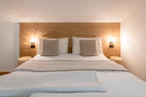 Voodi või voodid majutusasutuse Negritella Sweet Hotel toas