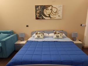 Giường trong phòng chung tại La Luna e il Sole