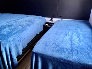 Cama ou camas em um quarto em Residencial Gralha Azul
