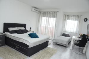 Letto o letti in una camera di Apartmani Sofronic Loznica 2