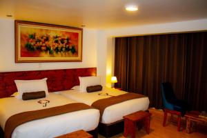 Voodi või voodid majutusasutuse Hotel Tara Machupicchu toas