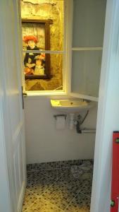 a bathroom with a sink and a window at FSQH SECRET TOWER in Szeged +18 photos