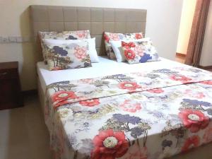 Postel nebo postele na pokoji v ubytování Sky Residence Hikkaduwa