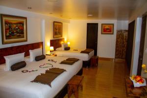 Voodi või voodid majutusasutuse Hotel Tara Machupicchu toas