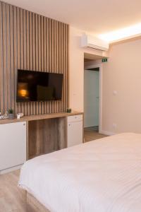 TV a/nebo společenská místnost v ubytování Galaxy Apartments