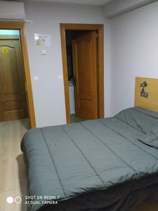 Cama o camas de una habitación en Albergue Turistico La Torre