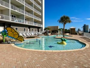 a swimming pool in the middle of a resort at Laketown Wharf! Sleeps 9 - Resort Beach Condo, Stunning Ocean Views! by Dolce Vita Getaways PCB in Panama City Beach