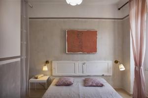 Postel nebo postele na pokoji v ubytování Casa Delia