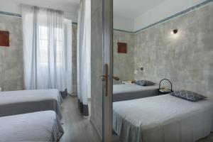 Postel nebo postele na pokoji v ubytování Casa Delia