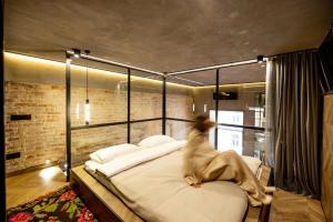 Ένα ή περισσότερα κρεβάτια σε δωμάτιο στο VULYK - Sauna -