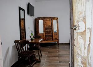 TV a/nebo společenská místnost v ubytování Hotel Boutique Don Porfirio