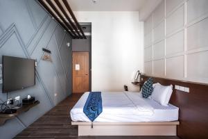 Giường trong phòng chung tại Toutsu Asami Guest House