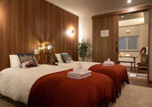 Miidokoro House Hotel客房内的一张或多张床位