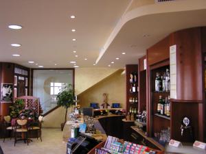 a room with a store with a counter at Hotel Mistral in Portoscuso