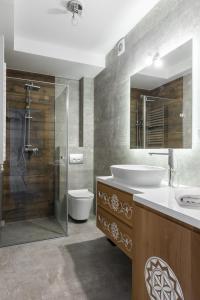 Kúpeľňa v ubytovaní Apartamenty Parzenica Zakopane