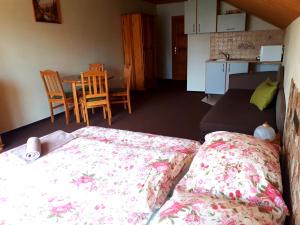 A bed or beds in a room at Privat Mrzkan
