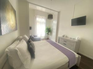 B&B Guest House Du Lac客房内的一张或多张床位