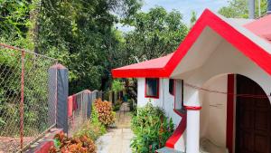 Zahrada ubytování Mitra Hostel Vagator + 28 fotografií