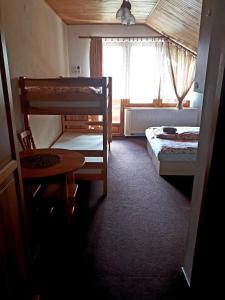 A bed or beds in a room at Privat Mrzkan