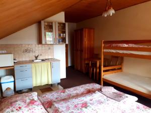 A bed or beds in a room at Privat Mrzkan