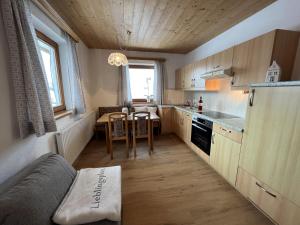Kuchyň nebo kuchyňský kout v ubytování Appartement Windaublick