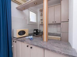 Kuchyň nebo kuchyňský kout v ubytování Nerja Sun Apartment Solmarengo Torrecilla