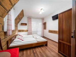 Posteľ alebo postele v izbe v ubytovaní Willa Pod Reglami Małe Ciche Sauna & Jacuzzi