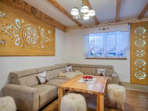 Posedenie v ubytovaní Willa Pod Reglami Małe Ciche Sauna & Jacuzzi