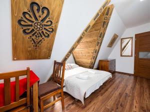 Posteľ alebo postele v izbe v ubytovaní Willa Pod Reglami Małe Ciche Sauna & Jacuzzi