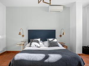 Postel nebo postele na pokoji v ubytování limehome Granada Calle Santa Ana