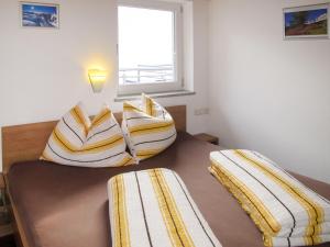 Posteľ alebo postele v izbe v ubytovaní Apartment Rubin by Interhome