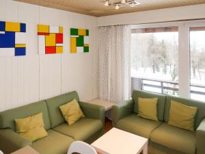 Area tempat duduk di Apartment Résidence Velan-24 by Interhome