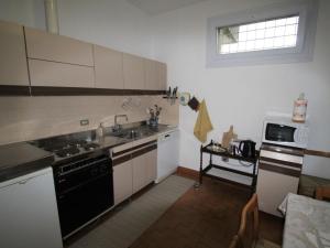 A kitchen or kitchenette at Apartment Lungolago by Interhome