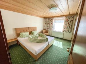 Postel nebo postele na pokoji v ubytování Apartment Apart Grazia-3 by Interhome