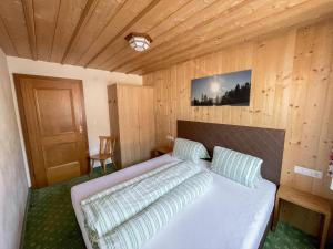 Postel nebo postele na pokoji v ubytování Apartment Apart Grazia-3 by Interhome