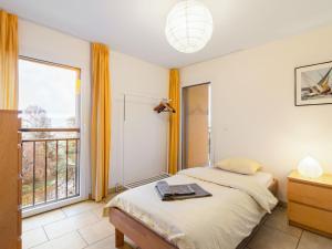 Katil atau katil-katil dalam bilik di Apartment Cook P1-3 by Interhome