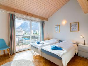 Una cama o camas en una habitación de Apartment Vasco de Gama B8-R by Interhome