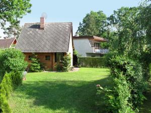 a house with a large yard with a house at Chalet Jiri - DEH110 by Interhome in Žabovřesky
