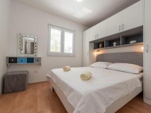 Posteľ alebo postele v izbe v ubytovaní Holiday Home Milka by Interhome
